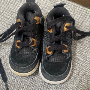 Size 6 faded nubuck black and gold Jordans